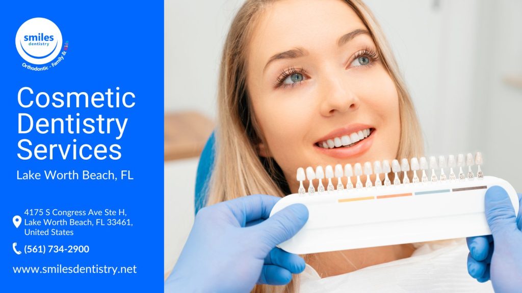 A woman smiling behind a dental shade guide, showcasing the transformative possibilities of cosmetic dentistry with various tooth color options for matching dental work.