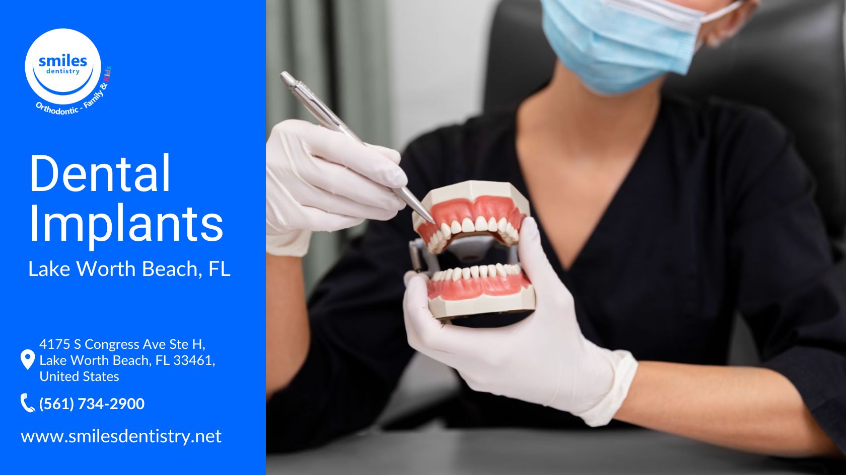 A woman with a mask and gloves demonstrates dental care by holding a pen next to a teeth model.
